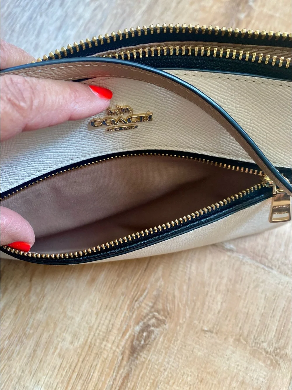 Coach Cream and Black Zip Wristlet